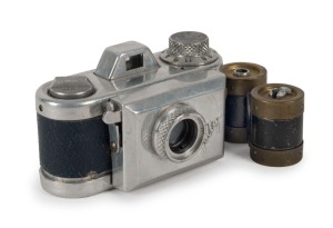 KAMERA WERKSTÄTTEN (MUNICH): Rare Jolly subminiature camera, circa 1950, in blue leatherette, with four original rollfilm spools, of which two are fitted inside the camera body. One of the earliest small cameras to be produced in post-war Germany.
