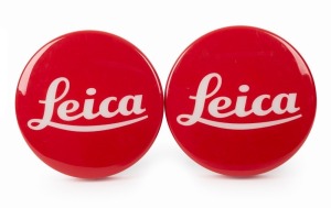 LEITZ: Two rare Leica 'Red Dot' point-of-sale wall lamps, in non-functional condition. (2 items)