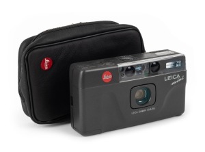 LEITZ: Special-edition 'Olympia 1992' Leica Mini point-and-shoot camera [#1847294] with Elmar 35mm f3.5 lens, presented in maker's box with leather case, wrist strap, and instruction booklet. Produced to commemorate the 1992 Barcelona Olympics, 500 of the