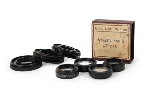 LEITZ: Four close-up lenses (two HEPET, one HEPRO, and one ELPIK in original maker's box), together with three intermediate ring attachments for 50mm Summar lens (two VORGI and one VMCOO). (7 items)