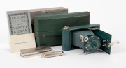 KODAK: Vanity Kodak Ensemble vertical-folding camera [#34553] in green finish, circa 1928, complete with original lipstick, powder compact, mirror, and money pocket in leather case with strap, together with instructions, original owner's card, and maker's - 2
