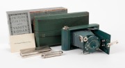 KODAK: Vanity Kodak Ensemble vertical-folding camera [#34553] in green finish, circa 1928,&nbsp;complete with original lipstick, powder compact, mirror, and money pocket in leather case with strap,&nbsp;together with&nbsp;instructions, original owner's card, and&nbsp;maker's - 2
