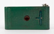KODAK: Vanity Kodak Ensemble vertical-folding camera [#34553] in green finish, circa 1928, complete with original lipstick, powder compact, mirror, and money pocket in leather case with strap, together with instructions, original owner's card, and maker's - 7