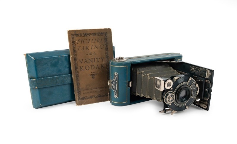 KODAK: Vanity Kodak vertical-folding camera [#38735] in bluebird finish with coloured bellows, circa 1928, complete with instruction booklet in original matching satin-lined case.