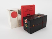 KODAK: Display replica of the Kodak No.1, produced in 1988 to commemorate the 100th anniversary of the original Kodak camera. Presented in maker's box with leather case, instruction booklet, and other related written material, this example is number 320 o - 2