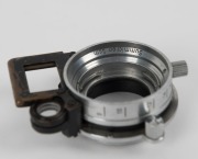 LEITZ: Four Leica near-focusing devices, including examples with SOOKY, NOOKY, and NOOKY-HESUM&nbsp;designations.&nbsp;(4 items) - 2