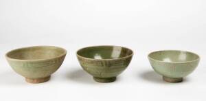 Three Longquan celadon bowls, with incised designs, Yuan Dynasty, 14th century, 14.8cm, 14.4 and 12.4cm diameter