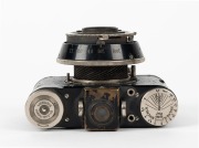 NAGEL: Pupille 127 film camera [#101 470], circa 1931, with Elmar 50mm f3.5 lens [#110475]. Known as the 'Rolloroy' in the United Kingdom. - 4