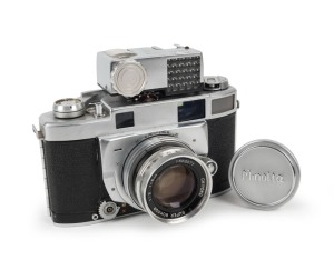 MINOLTA: Minolta Super A rangefinder camera [#104849], circa 1957, with Super Rokkor 50mm f2 lens [#1503071], 'Minolta-Meter' selenium meter attachment, and metal lens cap.