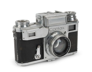 ZEISS IKON: Circa 1938 Contax III rangefinder camera [#G11811] with German eagle, 'M' (marine), and 'ARTL.' (artillery) engravings. Also featuring a rare Sonnar 50mm f2 lens [#2587382] construction with alloy aperture ring. Produced in extremely small qua