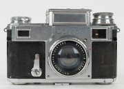 ZEISS IKON: Circa 1938 Contax III rangefinder camera [#G11811] with German eagle, 'M' (marine), and 'ARTL.' (artillery) engravings. Also featuring a rare Sonnar 50mm f2 lens [#2587382] construction with alloy aperture ring. Produced in extremely small qua - 2