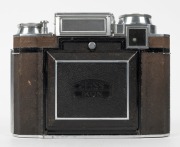 ZEISS IKON: Super Ikonta BX 533/16 horizontal-folding camera [#J 97643], circa 1938, with Tessar 80mm f2.8 lens [#2445184] and Compur-Rapid shutter. - 2