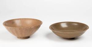 Two Longquan celadon bowls, one from shipwreck with coral attached to the base, Yuan Dynasty, 14th century, 16cm diameter
