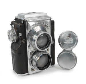 ZEISS IKON: Original 1935 Contaflex 860/24 TLR camera [#A 75528], with Sonnar 50mm f1.5 lens [#2135502] and metal lens cap. The first camera with built-in photoelectric exposure meter. 