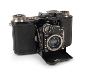 ZEISS IKON: Black enamel and leather Super Nettel 536/24 horizontal-folding rangefinder camera [#Y.32792], circa 1935, with Tessar 50mm f3.5 lens [#1403449].