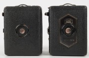 ZEISS IKON: Two Baby-Box 54/18 127 film cameras - one circa 1930 model with leather front, and one circa 1934 model with metal front. (2 cameras) - 2