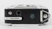 GOERZ: Minicord subminiature TLR camera [#4201], circa 1951, with Helgor&nbsp;25mm f2 lens [#4342], together with instruction booklet. One of the smallest TLR cameras ever made. - 4