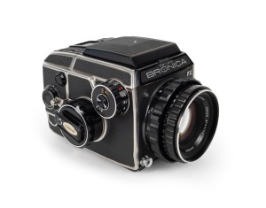 BRONICA: Bronica EC-TL SLR camera [#CB357092], circa 1975, with Zenzanon MC 80mm f2.4 lens [#802564]. Presented in maker's box with instruction booklet.