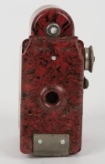 CORONET: Red-body Midget subminiature Bakelite box camera, circa 1935, with Taylor Hobson Meniscus lens, together with leather maker's pouch. - 3