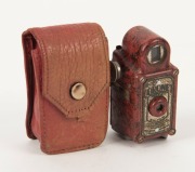 CORONET: Red-body Midget subminiature Bakelite box camera, circa 1935, with Taylor Hobson Meniscus lens, together with leather maker's pouch. - 4