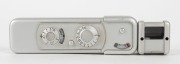 MINOX: Chrome-body Minox BL subminiature camera [#1 209 907], circa 1972, with Minox 15mm f3.5 lens and waist-level finder attachment. - 4