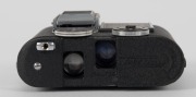 CONCAVA: Black-body Tessina 35 subminiature camera [#769009], circa 1970, with Tessinon 25mm f2.8 lens, together with maker's box. - 3