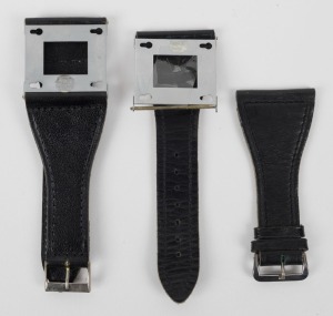 CONCAVA: Two Tessina wrist bracket strap accessories, with one in original packaging. A testament to the use of Tessina subminiature cameras by Cold War spy agencies such as the East-German Stasi.