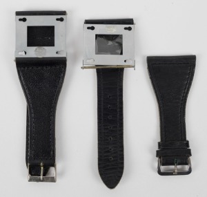 CONCAVA: Two Tessina wrist bracket strap accessories, with one in original packaging. A testament to the use of Tessina subminiature cameras by Cold War spy agencies such as the East-German Stasi.