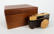 KONICA: 1993&nbsp;120th-anniversary edition&nbsp;Hexar Gold [#EG0000003] viewfinder camera, with Hexar&nbsp;35mm f2 lens. This camera features a burnished gold finish with a 24-carat gold serial number plate affixed to the side,&nbsp;indicating that this particular example w - 2