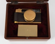 KONICA: 1993&nbsp;120th-anniversary edition&nbsp;Hexar Gold [#EG0000003] viewfinder camera, with Hexar&nbsp;35mm f2 lens. This camera features a burnished gold finish with a 24-carat gold serial number plate affixed to the side,&nbsp;indicating that this particular example w - 4