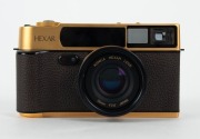 KONICA: 1993&nbsp;120th-anniversary edition&nbsp;Hexar Gold [#EG0000003] viewfinder camera, with Hexar&nbsp;35mm f2 lens. This camera features a burnished gold finish with a 24-carat gold serial number plate affixed to the side,&nbsp;indicating that this particular example w - 5