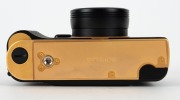 KONICA: 1993&nbsp;120th-anniversary edition&nbsp;Hexar Gold [#EG0000003] viewfinder camera, with Hexar&nbsp;35mm f2 lens. This camera features a burnished gold finish with a 24-carat gold serial number plate affixed to the side,&nbsp;indicating that this particular example w - 8