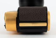 KONICA: 1993&nbsp;120th-anniversary edition&nbsp;Hexar Gold [#EG0000003] viewfinder camera, with Hexar&nbsp;35mm f2 lens. This camera features a burnished gold finish with a 24-carat gold serial number plate affixed to the side,&nbsp;indicating that this particular example w - 9