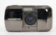 OLYMPUS: 1991 Olympus Mju-I Limited Edition compact camera with mirrored silver body [#0018845] and 35mm f3.5 lens. Presented in lined box with original leather case, instruction booklet, and warranty card. - 2