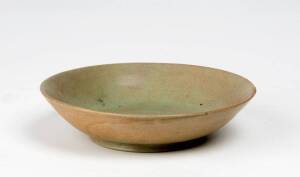 A small celadon dish, Song Dynasty 960-1279, five small spur marks on the base, 12.7cm diameter