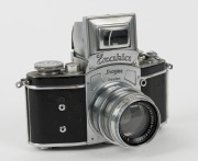 IHAGEE: Pre-war Kine Exakta I&nbsp;SLR camera [#608990], circa 1940, with Biotar&nbsp;58mm f2 lens [#2585067] and spirit level attachment. - 2