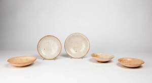 Five Qingbai dishes, Fujian, one with twin fish, Yuan Dynasty 1280-1368, largest one 17cm diameter