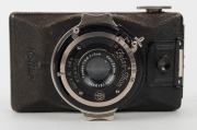 ZEISS IKON: Kolibri 523/18 127 rollfilm camera [#S.55149], circa 1930, with Tessar 50mm f3.5 lens [#1212430] and Compur shutter. - 2