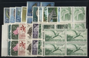 NORFOLK ISLAND: 19660 - 64 1d - 10/- definitives set of 19 in blks.4; the 6d - 2/3 being the Fish series and the 5d - 10d being the Views. (76). MUH.