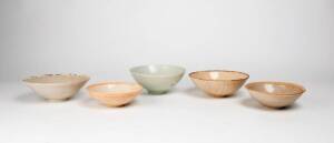 Five Qingbai bowls, two with incised designs and one with a lobbed rim, Yuan Dynasty 13th/14th century, 17.6cm to 15cm diameter