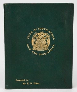 SOUTH AFRICA: 1935 IMPERIAL PRESS CONFERENCE: Green leather-bound souvenir stamp album "Presented to Mr. R.D. Elliott" an attendee at the conference in Capetown. The album contains the then current ½d to 10/- definitives set in pairs, the Voortrekker pair