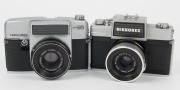 NIPPON KOGAKU: Two Nikkorex SLR cameras - one 1962&nbsp;Nikkorex 35-2 with Nikkor-Q&nbsp;50mm f2.5 lens [#394105], and one 1963 Nikkorex Auto 35 with Nikkor-H&nbsp;48mm f2 lens [#678487] in maker's box with instruction booklet. (2 cameras) - 2