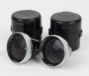 FRANKE & HEIDECKE: Two teleconverter lenses in their original black leather pouches - one Rollei-Mutar 1,7x [#3888938], and one Rollei-Mutar 0,6x [#3888387]. (2 items)