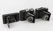 ZEISS IKON: Three vertical folding cameras - one circa 1949 Ikonta 521 [#N 52211 *] with Novar 75mm f6.3 lens, one circa 1929 Ikonette 504/12 with Frontar 80mm f9 lens, and one circa 1937 Nettar 515 [#F 31094] with Novar 75mm f4.5 lens. (3 cameras)