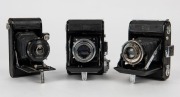 ZEISS IKON: Three vertical folding cameras - one circa 1949 Ikonta 521 [#P 85347] with Tessar 75mm f3.5 lens, one circa 1929 Ikonette 504/12 with Frontar 80mm f9 lens, and one circa 1937 Nettar 515 [#C 44875] with Nettar 75mm f4.5 lens. (3 cameras)  - 5