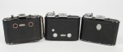 ZEISS IKON: Three vertical folding cameras - one circa 1949 Ikonta 521A [#P 65098 *] with Novar 75mm f4.5 lens, one circa 1929 Ikonta 521A [#F 49599] with Novar 75mm f3.5 lens, and one circa 1936 Ikonta 520 with Tessar 70mm f3.5 lens [#1737109]. (3 camera - 4