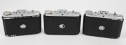 ZEISS IKON: Three Nettar horizontal-folding cameras - one circa 1950 [#N 86934] with Novar 75mm f4.5 lens and Vario shutter, one circa 1950 with Novar 75mm f6.3 lens and Vario shutter, and one circa 1952 [#Z 46075] with Novar 75mm f4.5 lens and Pronto shu - 3