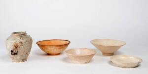 Two Qingbai bowls, Fujian and another small bowl and the bottom of a box and a small shipwreck jar, 14th century