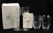 LEITZ: Four Leica-branded&nbsp;drinking glasses, including two wine glasses, in maker's boxes.&nbsp;(4 items)&nbsp;