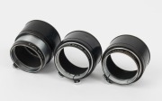 LEITZ: Three Leica FIKUS variable lens hoods, each with a different variation in engraving detail.&nbsp;(3 items)